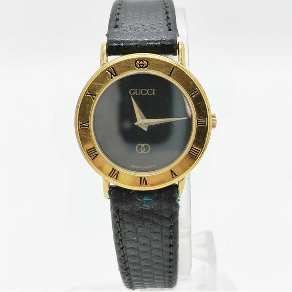 Gucci Gold and Black Timepiece - Picture 1 of 9